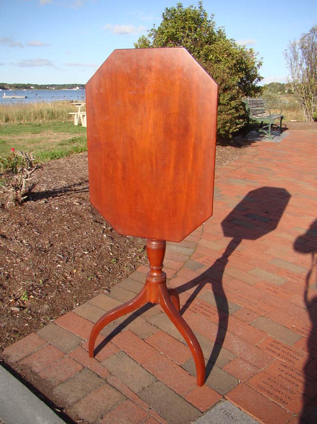 A fine late 18th century Hepplewhite cherry tilt-top candle stand on spider legs circa 1790
